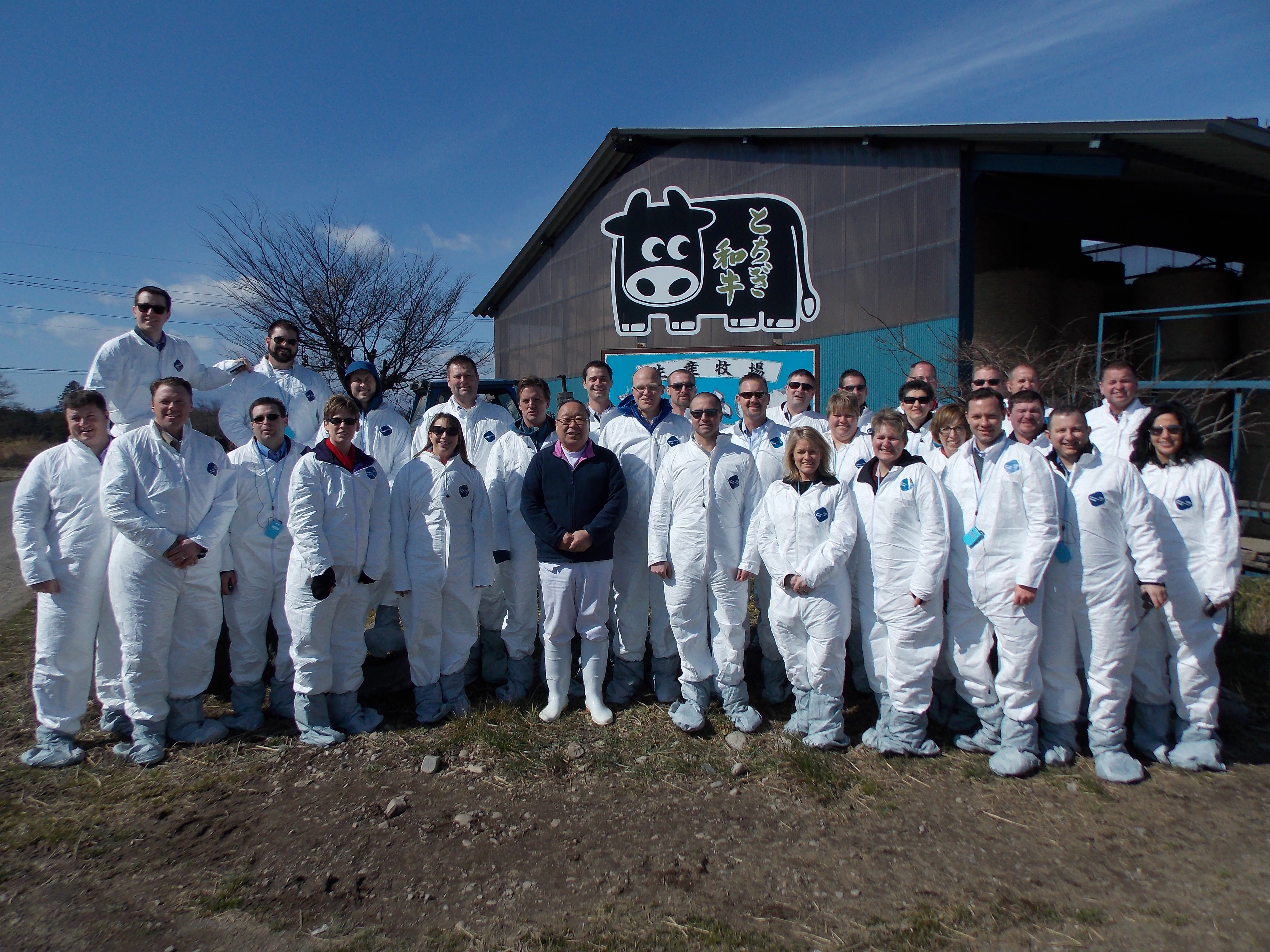 Dr. Iso, center of photo, hosted the class for a special visit to a Wagyu beef farm and a dairy operation.